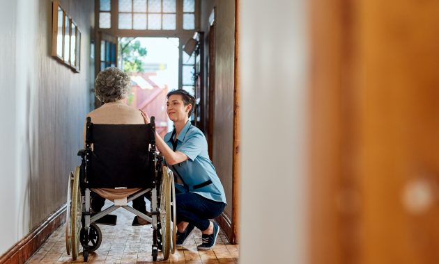 A nurse caring for a senior patient in a retirement home